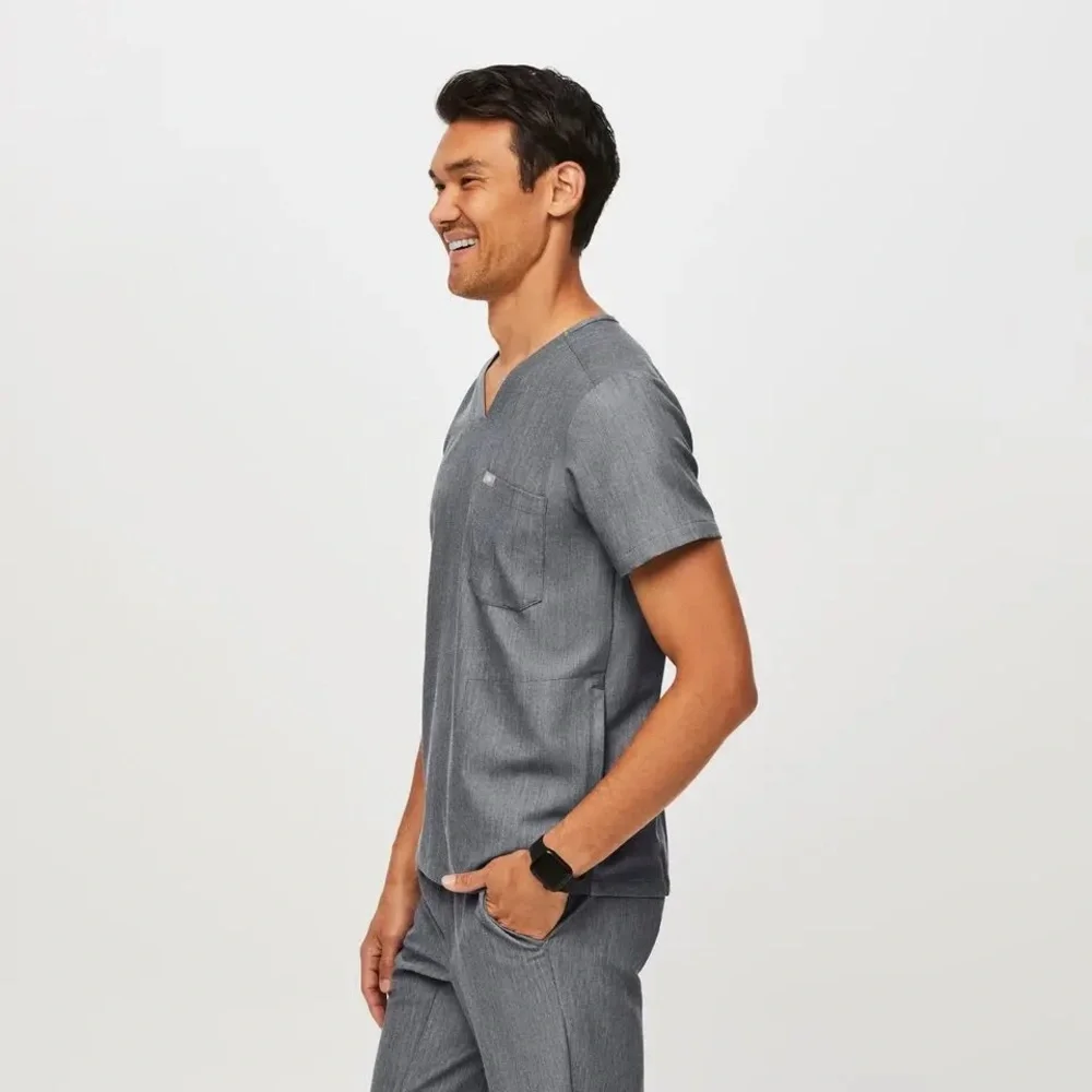 Men’s Chisec‎ Three-Pocket Scrub Top in Graphite Gray.
